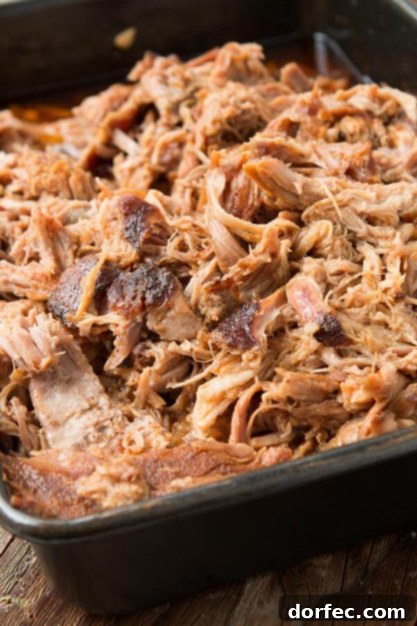 Carolina pulled pork in metal baking dish