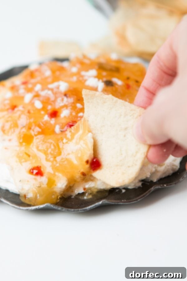 One of the easiest appetizers you could ever make and it's so good! Pineapple habanero dip! ohsweetbasil.com One of the easiest appetizers you could ever make and it's so good! Pineapple habanero dip! ohsweetbasil.com