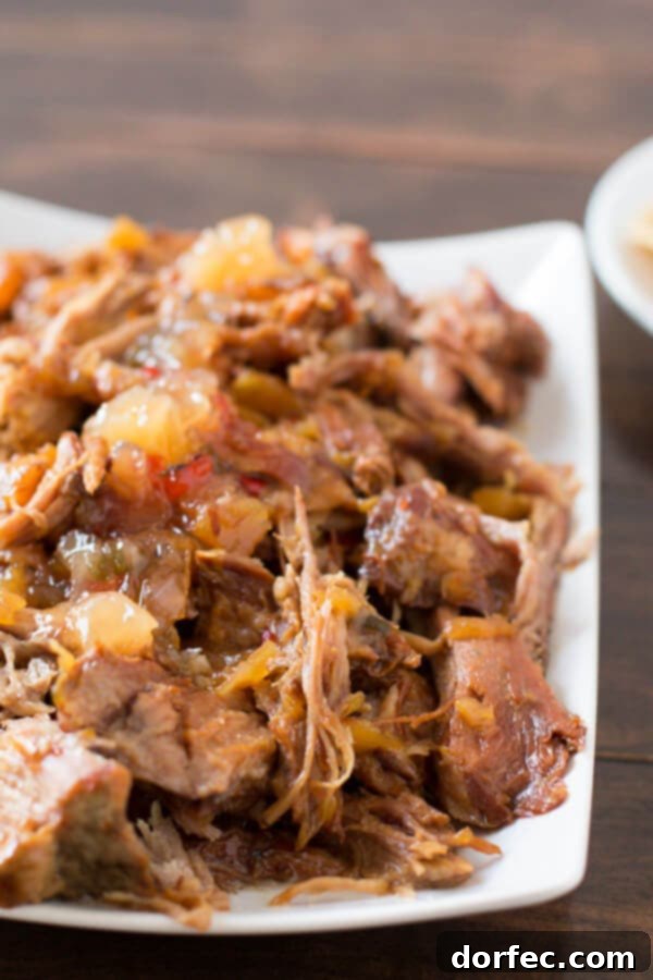 Pineapple Fire Dip 5 Pineapple Habanero Pork in the slow cooker with 3 ingredients! ohsweetbasil.com