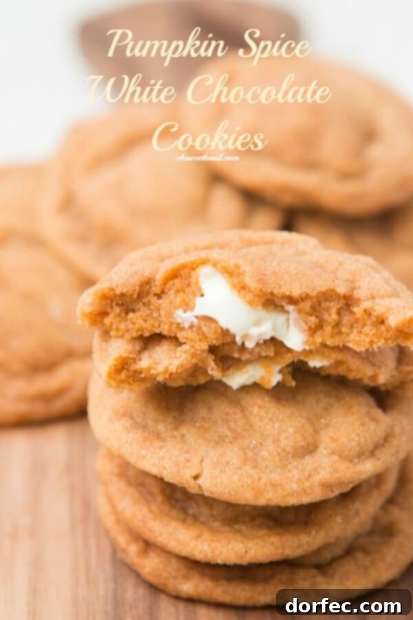 White Chocolate Stuffed Pumpkin Spice Pudding Cookies - a rich, spiced cookie with a creamy white chocolate center, ideal for autumn indulgence. Recipe by ohsweetbasil.com.