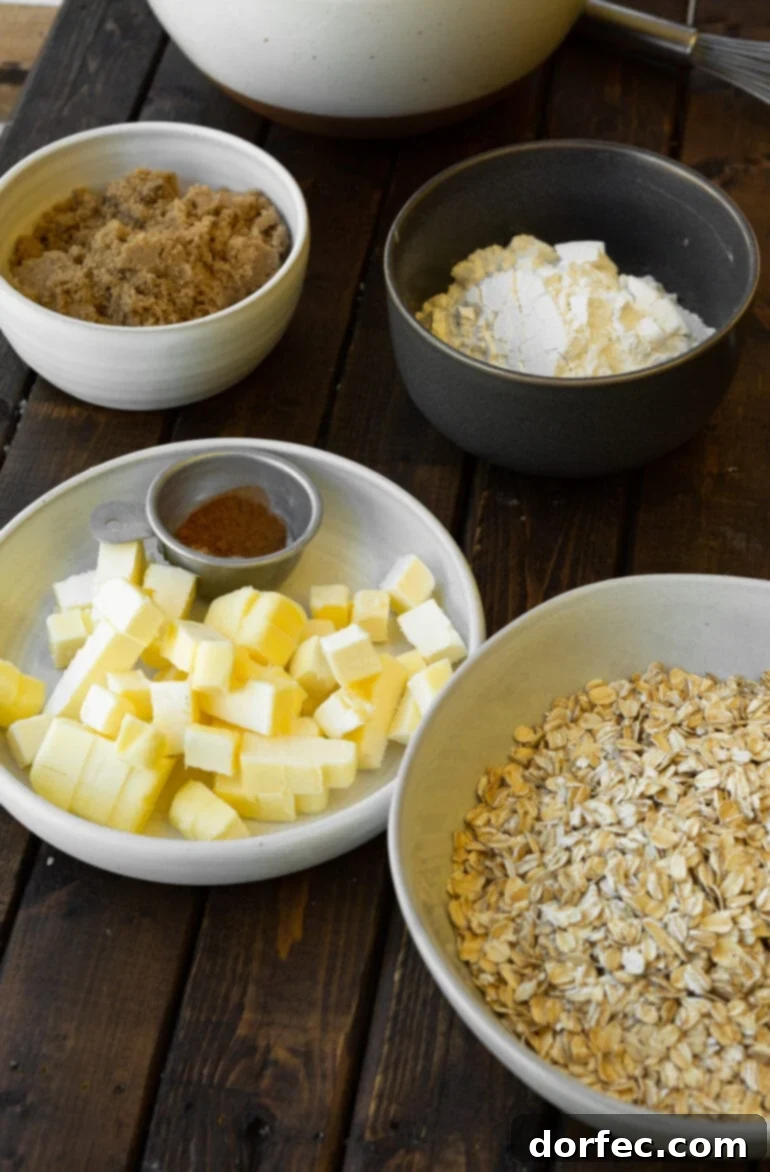 A photo of several bowls filled with all the different ingredients for apple crisp topping, showcasing fresh, high-quality components.