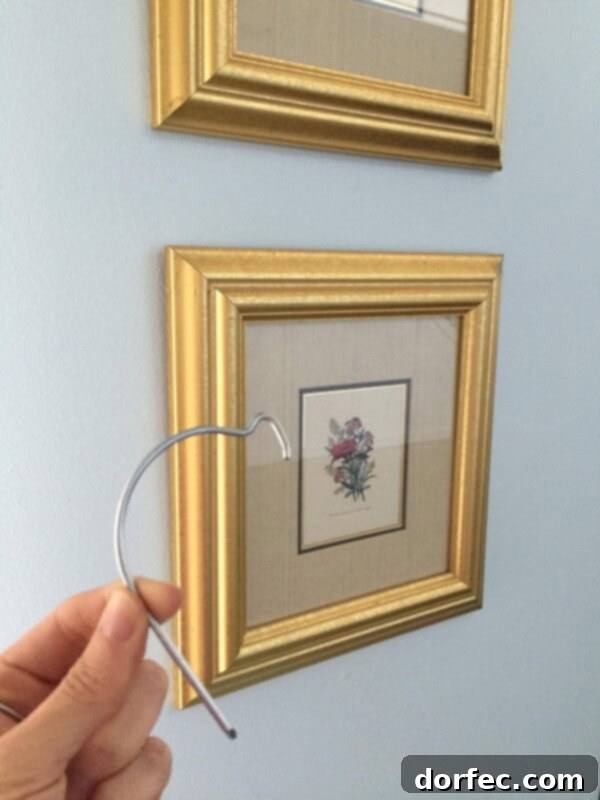 The Baby Bump: A Celebration of New Life 7 picture hanging hooks from Lowes, easy DIY wall decor