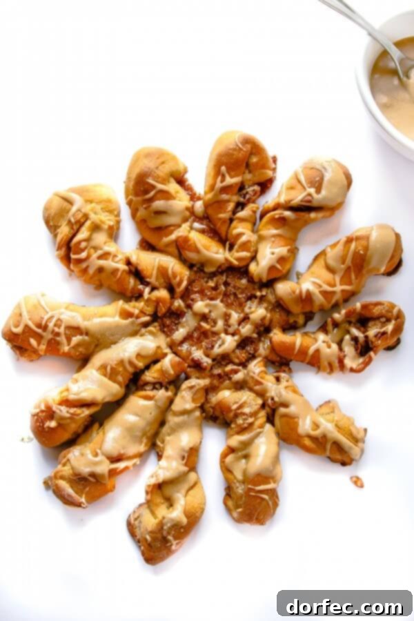 Soft and fluffy maple infused cinnamon roll twists covered in sweet maple glaze. Yum! Soft and fluffy maple infused cinnamon roll twists covered in sweet maple glaze. Yum!