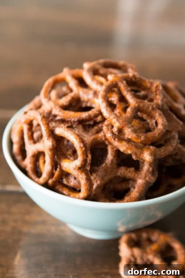 A close-up of sweet and salty candied pretzels, perfect for snacking at home or on the go.