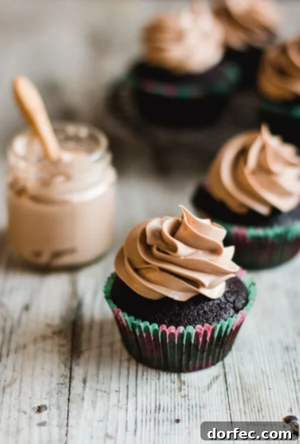 Moist and super chocolatey milk chocolate cupcakes topped with a perfectly smooth milk chocolate frosting that tastes incredible.