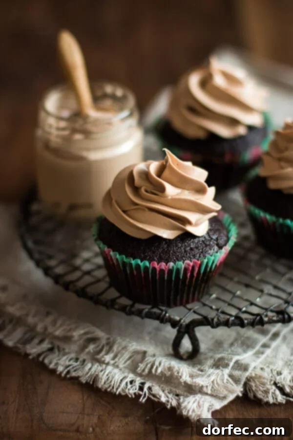 Moist and super chocolatey milk chocolate cupcakes topped with a perfectly smooth milk chocolate frosting that tastes incredible.