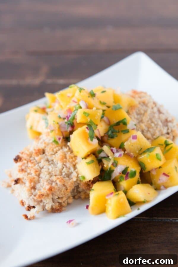Bringing the island vibes home with perfectly cooked macadamia crusted mahi mahi served alongside a refreshing mango salsa.