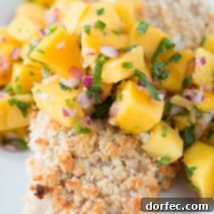 Our favorite way to enjoy mahi mahi with with this coconut marinade, macadamia crust and mango salsa! ohsweetbasil.com