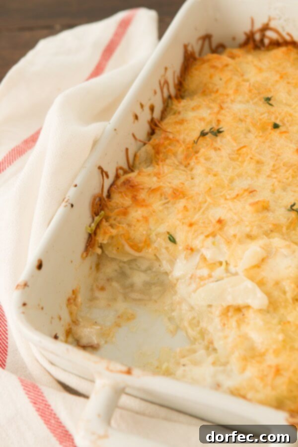 Rich and creamy Smoked Gruyere Scalloped Potatoes with Leeks, a perfect cheesy side dish.