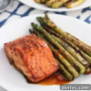 Sweet and Spicy Orange Salmon is a family favorite with an easy and flavorful sauce. Takes 45 minutes (including time to marinate)!