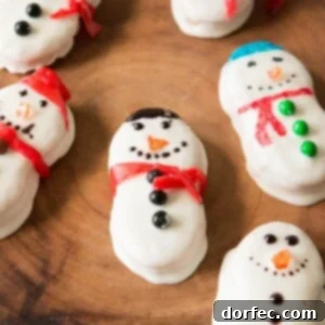 Nutter Butter Snowmen, a quick and easy no-bake holiday treat for Christmas.
