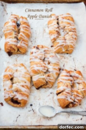Delicious Cinnamon Roll Apple Danishes, quick to prepare and ready in just 15 minutes for a delightful breakfast or dessert.