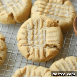 A freshly baked peanut butter cookie, golden and inviting.