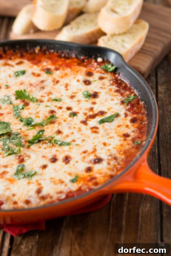Game day cheesy lasagna dip, a hearty and comforting appetizer