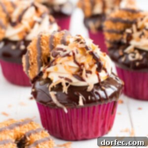 Girl scout cookie meets cupcake in these rich chocolaty, caramel, and toasted coconut Samoa Cupcakes!