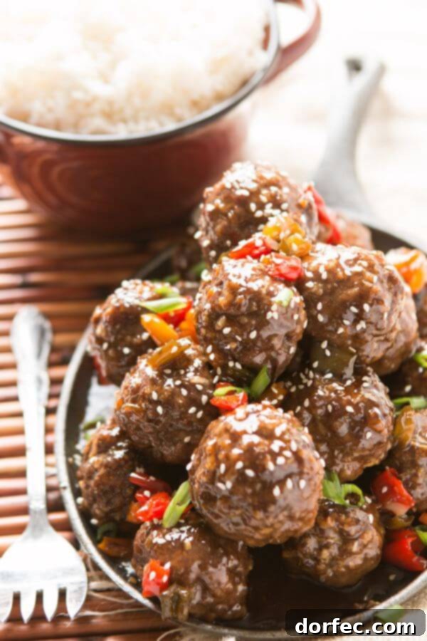 Sweet and sour meatballs for the oven or slow cooker are perfect for dinner or an appetizer for football parties, really anytime! Sweet and sour meatballs are perfect for dinner or an appetizer for football parties, really anytime! Delicious sweet and sour meatballs! They are the perfect appetizer for your next tailgate party. They can be baked in the oven, slow cooker, crock pot, insta-pot you name it!