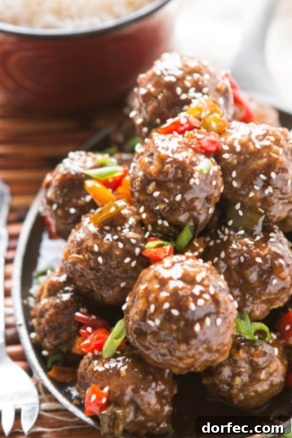 How to make sweet and sour meatballs: A simple dump and stir recipe. These sweet and sour meatballs for the oven or slow cooker are perfect for dinner or an appetizer for football parties, really anytime! Delicious sweet and sour meatballs! They are the perfect appetizer for your next tailgate party. They can be baked in the oven, slow cooker, crock pot, insta-pot you name it!