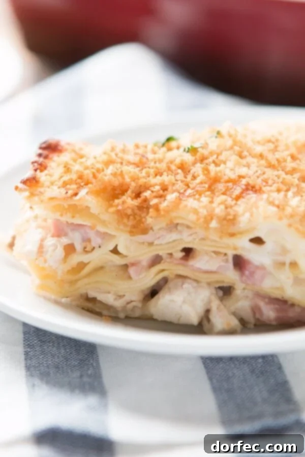 Assembled Chicken Cordon Bleu Lasagna, ready for baking or refrigeration, showcasing its layered goodness.