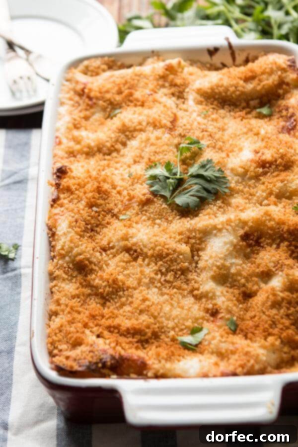 Delicious Chicken Cordon Bleu Lasagna with a crispy panko topping, featuring tender rotisserie chicken.