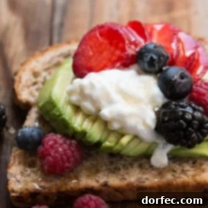 6 Fresh Ideas for Avocado Toast 3 Breakfast berry avocado toast with a drizzle of honey.