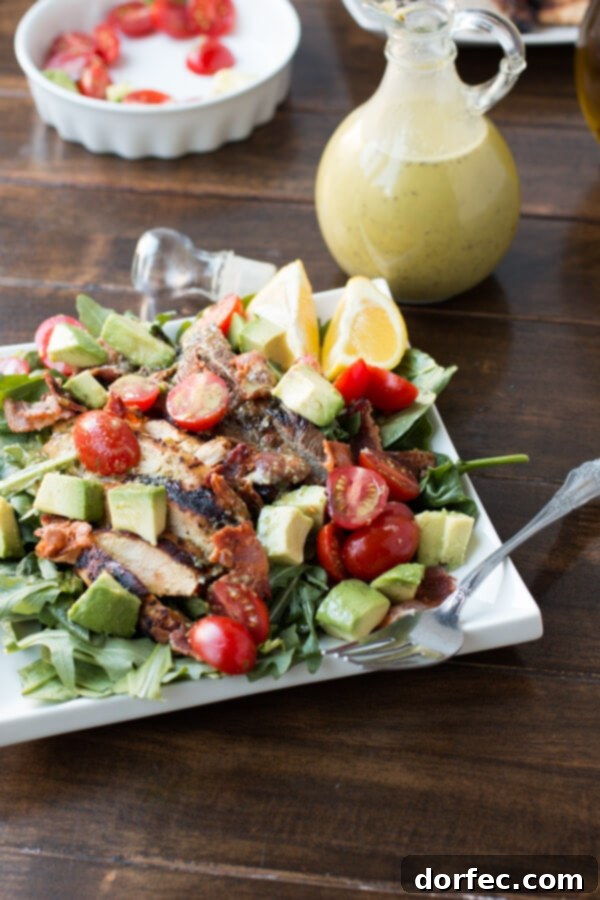 A hearty BLT salad featuring double the meat (steak, chicken, bacon) with minimal lettuce, packed with protein and flavor.