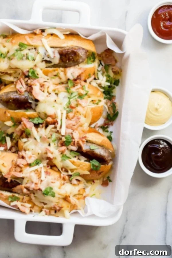 Delicious bratwurst hoagies loaded with crispy bacon and sweet caramelized onions on a toasted bun.
