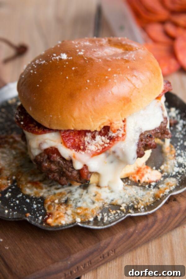 A delicious Pepperoni Pizza Burger, stacked high with savory pepperoni, melted cheese, and a juicy patty on a bun.