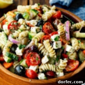 A beautifully presented Easy Greek Pasta Salad, captured in an inviting overhead shot.