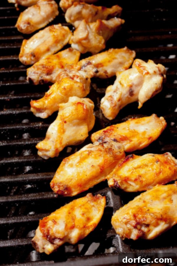 Detailed visual guide on how to grill chicken wings, showing steps from preparation to cooking on the grill.