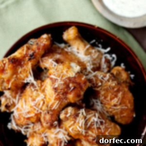 Everything you could ever want for Father's day, garlic parmesan grilled chicken wings! They are perfect for feeding a bunch of dude or just that one special dude. ;) ohsweetbasil.com