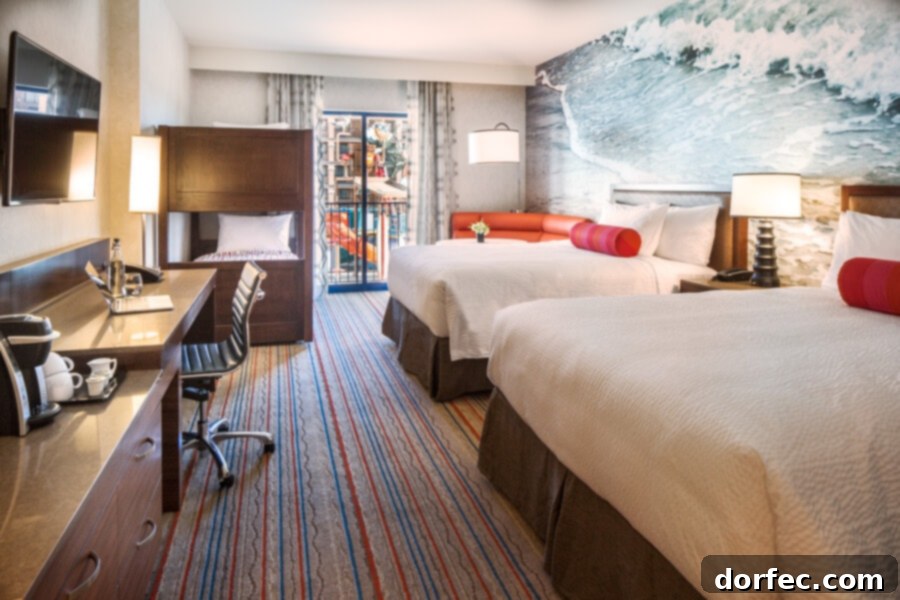 Family room with bunk beds at Courtyard Anaheim, ideal for large groups visiting Disneyland
