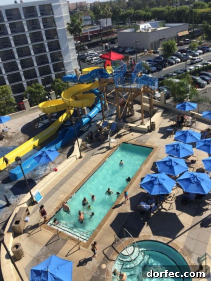Kids enjoying the exciting water park slides at Courtyard Anaheim hotel