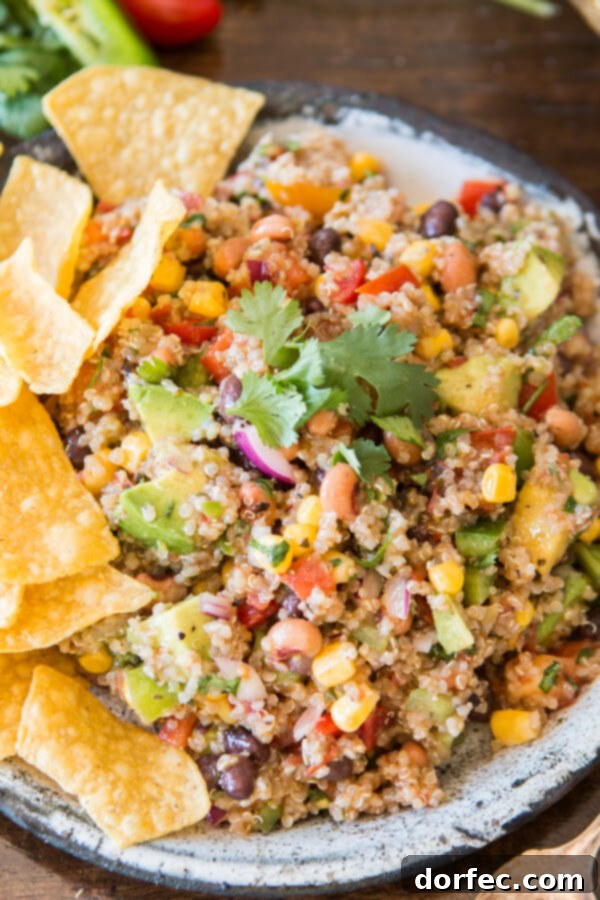 Cowboy Caviar Quinoa is a vibrant and healthy mashup, combining classic flavors with a wholesome quinoa base, perfect for summer entertaining.