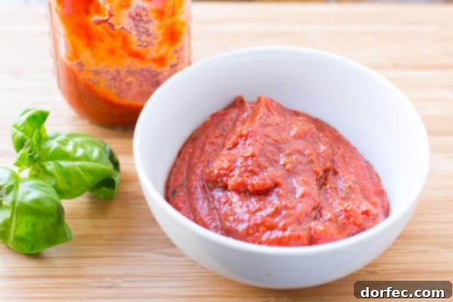 Our favorite homemade pizza sauce recipe, quick, easy, and with a secret ingredient for amazing flavor