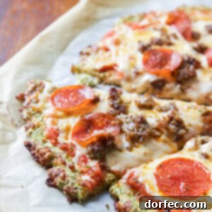 A close-up of a freshly baked zucchini pizza crust, ready for toppings