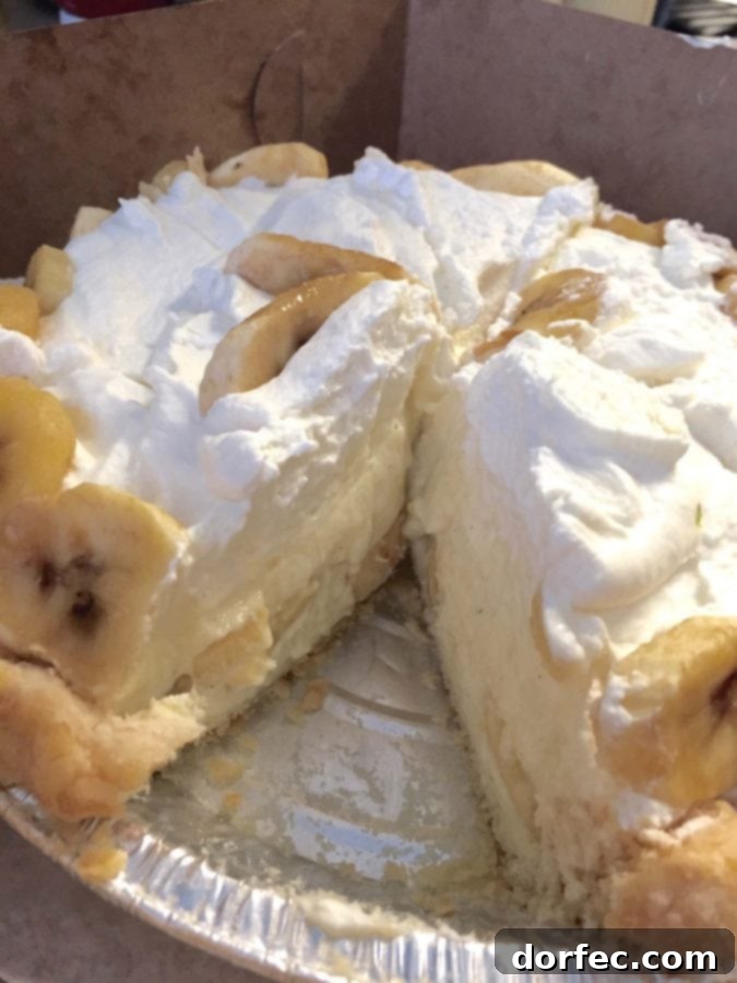 A delectable slice of banana cream pie from Tilt, a perfect dessert after a savory meal.