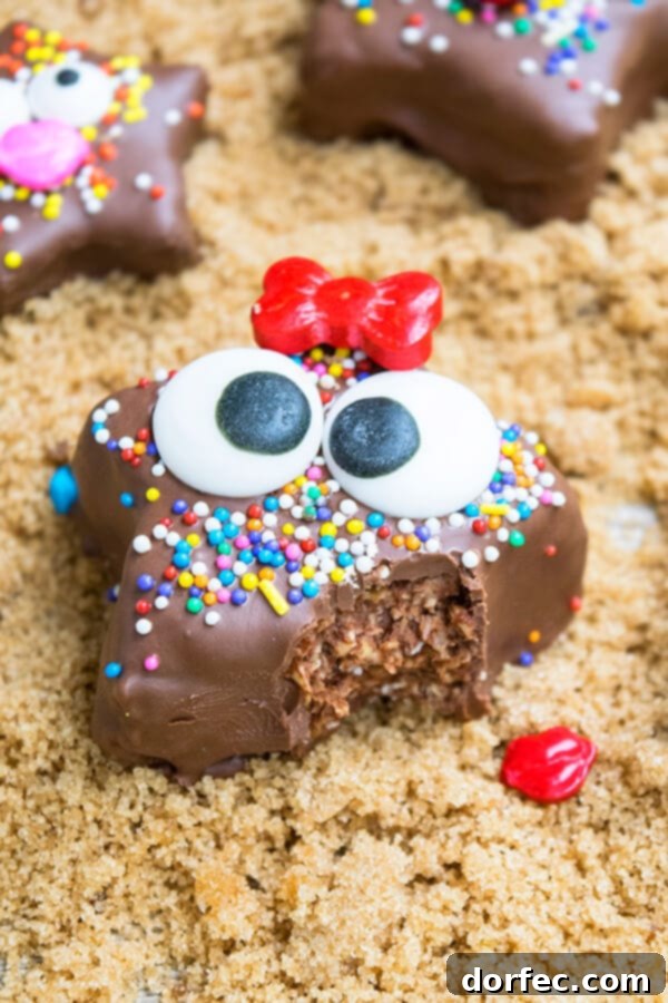 Creative Kids' Chocolate Starfish Snacks Assortment of decorated chocolate starfish granola bites on a serving tray, ready to eat.