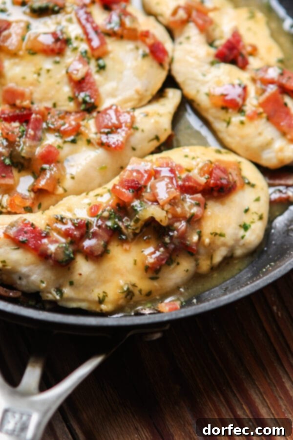 An overhead shot of the Honey Mustard Bacon Chicken Skillet in a rustic setting, emphasizing its vibrant colors and delicious appeal for a family meal.