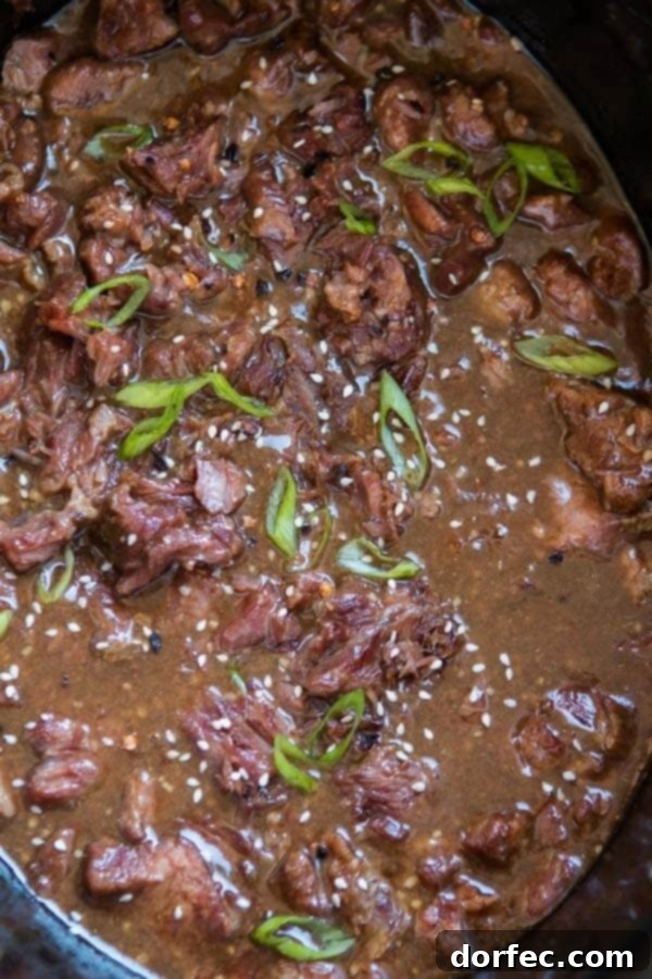 Delicious Slow Cooker Korean BBQ Beef ready for dinner, a family favorite recipe from Damn Delicious's new cookbook.