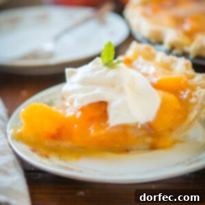 Sunshine Peach & Lemon Jell-O Pie 2 A vibrant slice of Lemon Jello Peach Pie with a perfect crust, ready for serving.