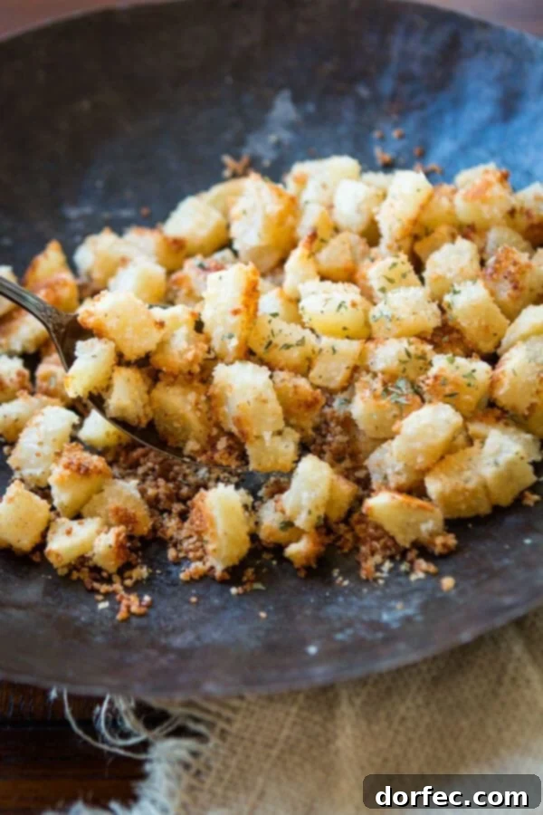 A baking sheet filled with golden, cheesy Shake N Bake Ranch Potatoes, fresh from the oven.