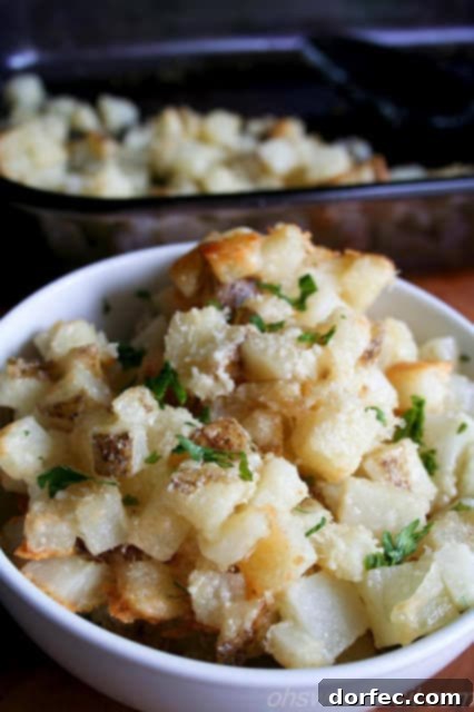 Close-up of golden Cheesy Potato Bites, a delicious and easy side dish.
