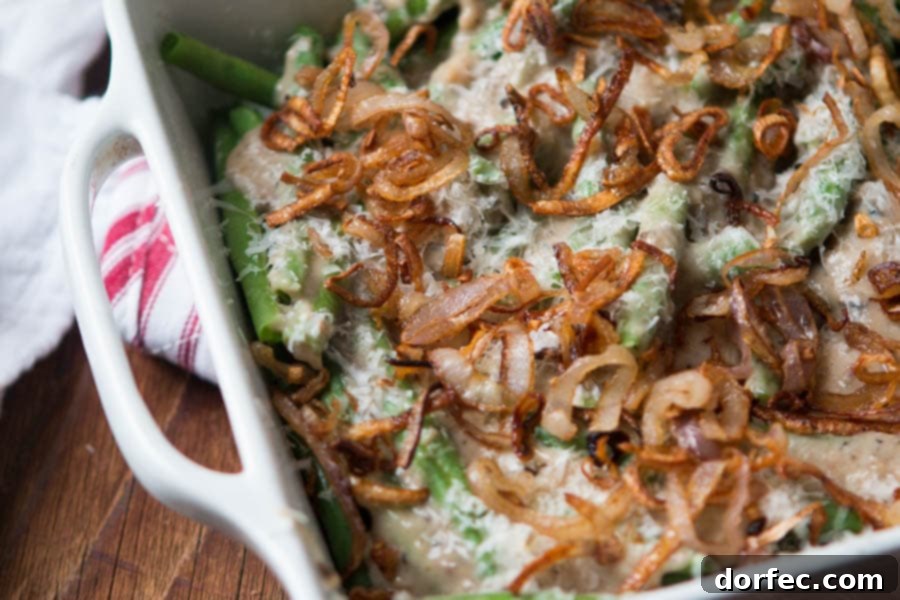 We all grew up on green bean casserole with cream of mushroom soup, but it's time to kick things up with Heritage Green Bean Casserole with Crispy Shallots. ohsweetbasil.com