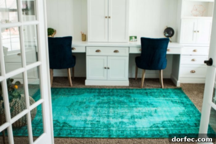 Experience the transformation of our drab room into a vibrant, family-friendly office. Cozy and bright home office with custom white cabinets and colorful accents