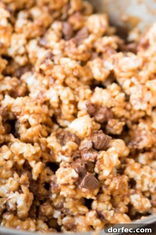 Reese's Krispies popcorn: peanut butter chocolate deliciousness in a snack.