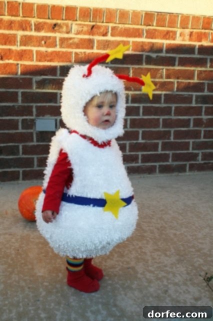 Kids dressed in Rainbow Brite and Twink costumes for Halloween.
