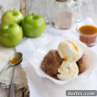 Sweet Skillet Apples 5 Golden-fried apple halves coated in cinnamon sugar, ready to be served