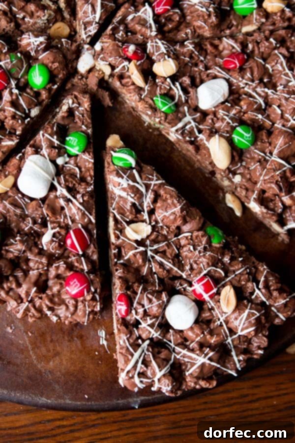 M&M Chocolate Pizza: A Beloved Family Holiday Recipe Family members enjoying slices of M&M chocolate pizza, a beloved and easy-to-make holiday dessert.