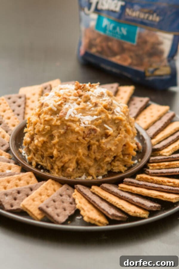 Love German chocolate cake? Especially that sticky coconut frosting? This German Chocolate Cake Cheese Ball is way easier than cake but just as delicious! ohsweetbasil.com