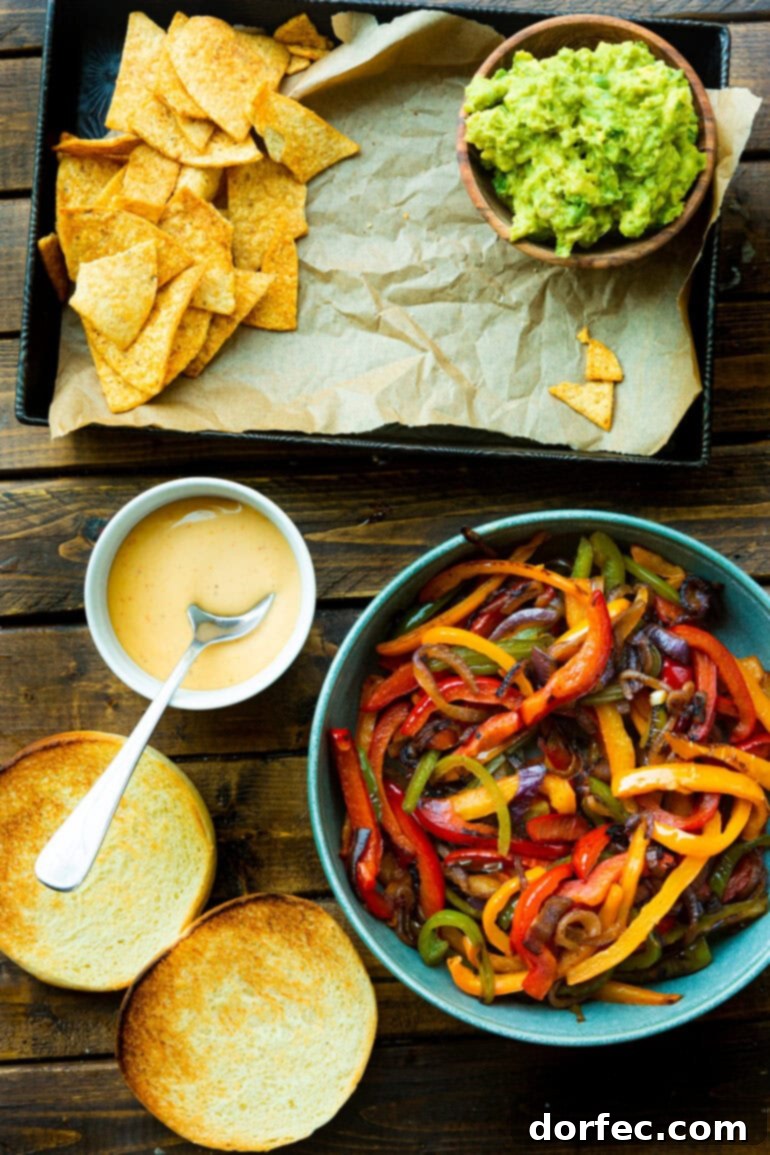 Sizzling Mexican Fajita Burgers 4 A vibrant flat lay photo showcasing all the fresh and colorful ingredients required to make delicious fajita style Mexican burgers, from spices to fresh produce and ground turkey.